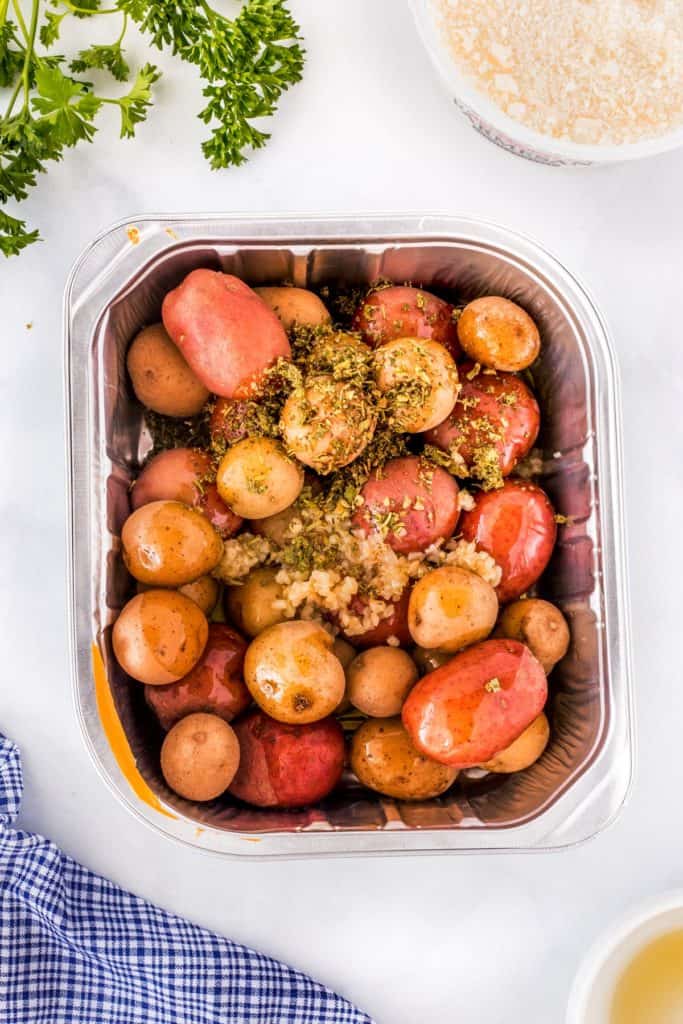 Herbs and garlic over Little Potatoes