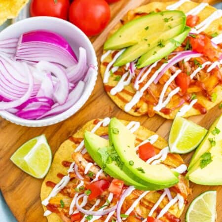 BBQ Chicken Tostadas on a wooden board.