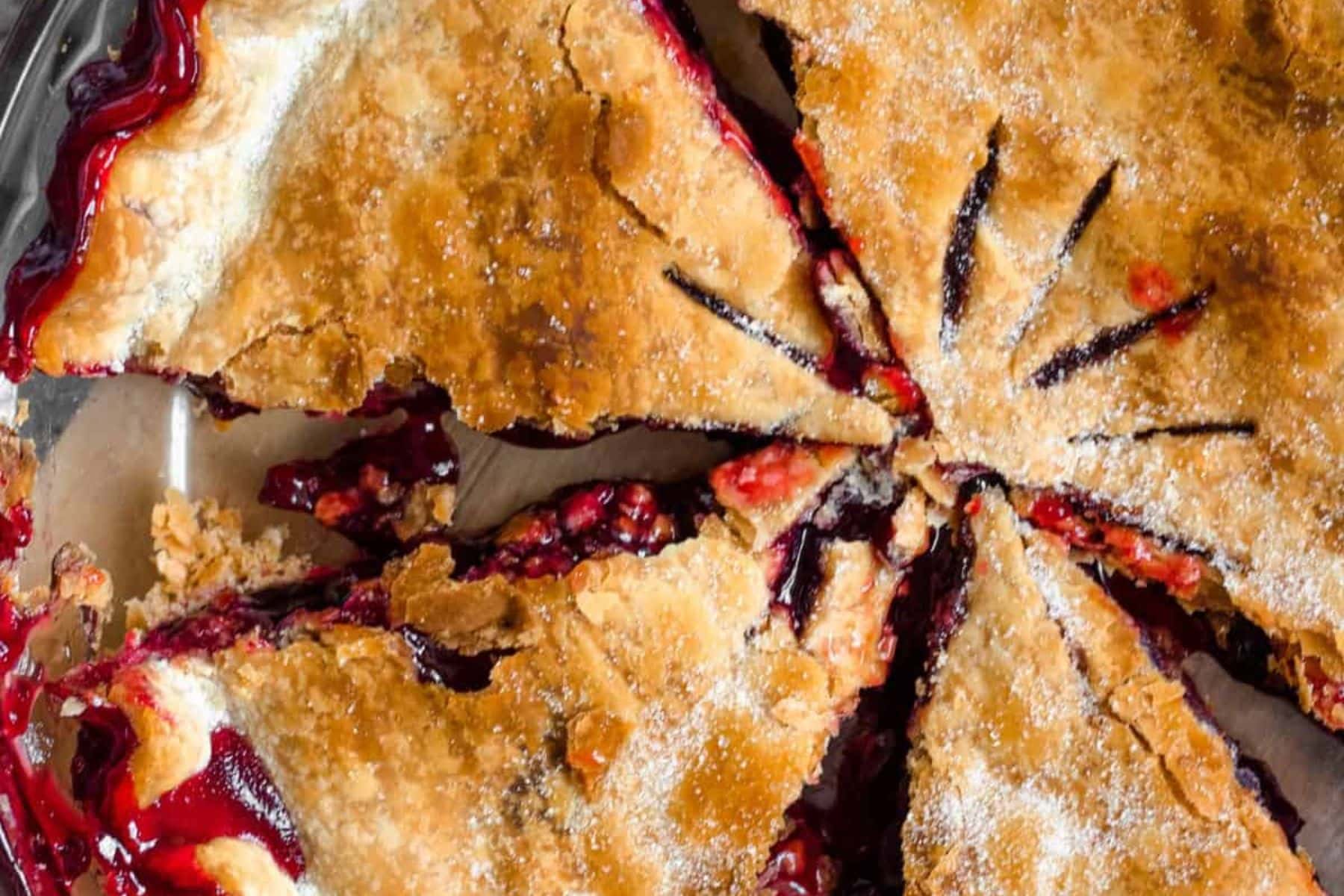 This Best Homemade Cherry Pie comes together quickly using frozen sweet cherries and pre-made crust, but it will taste as wonderful as any pie you will have with a lot less of the fuss. Close up of cherry pie.