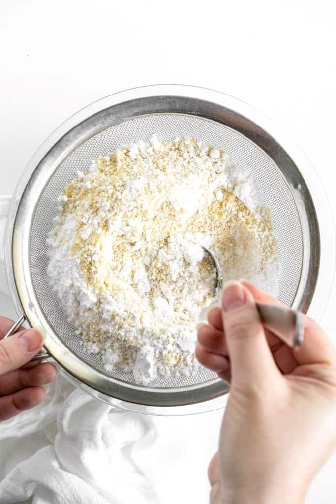 Stirring dry ingredients through a sieve