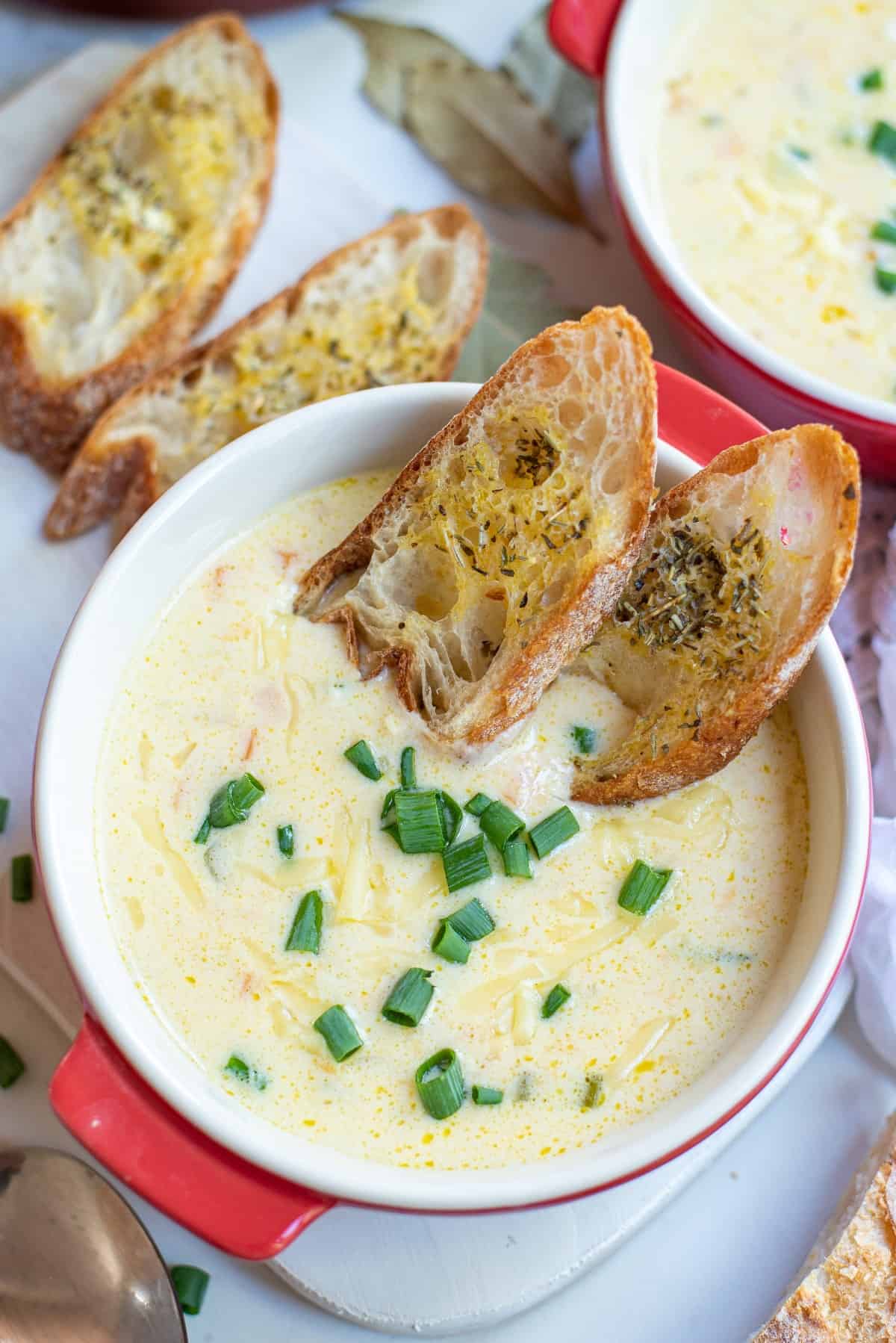 Beer Cheese Soup with two grilled crostinis. 