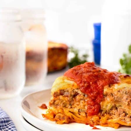 Instant Pot Lasagna on a plate with marinara sauce
