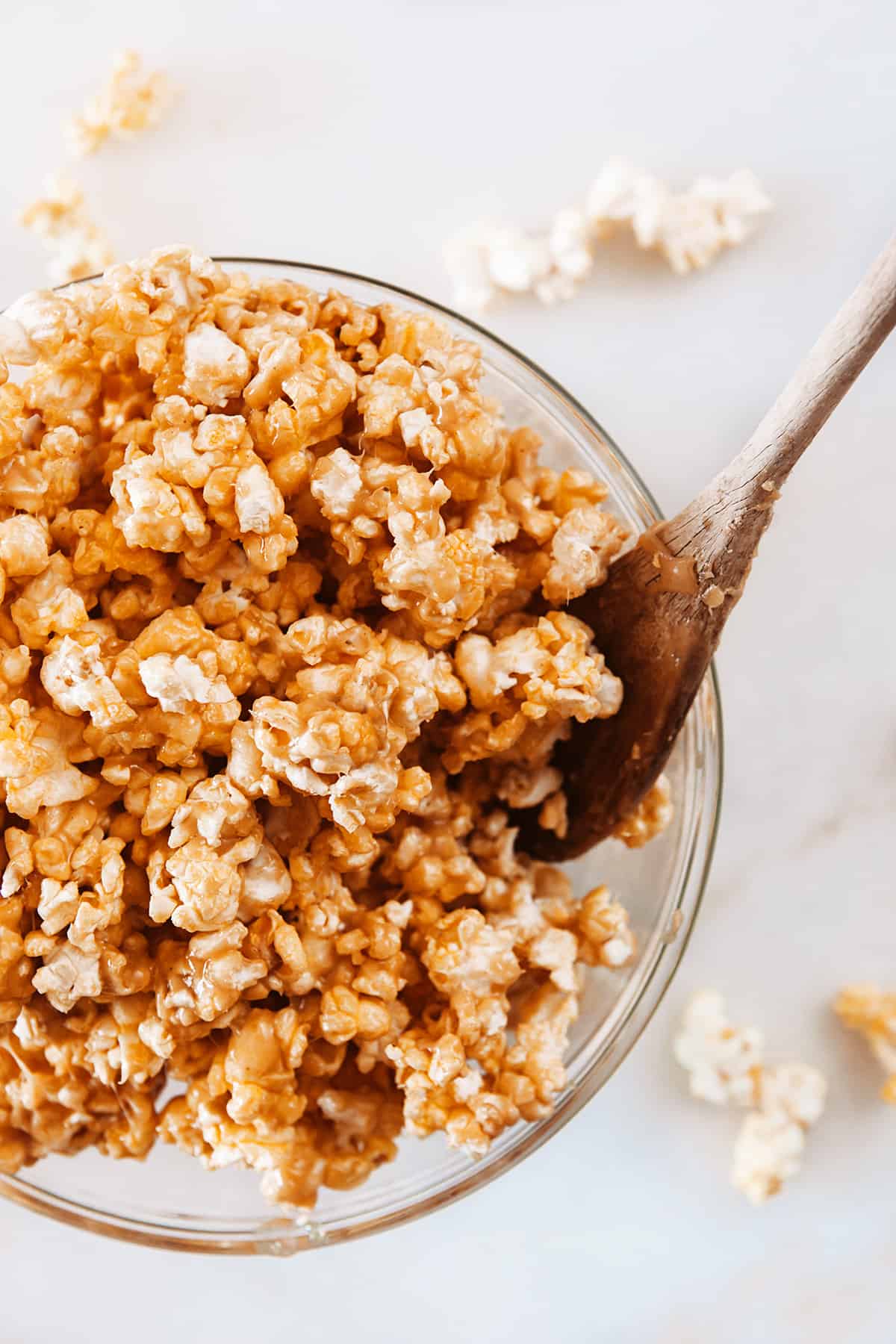 Stirring a bowl of peanut butter popcorn