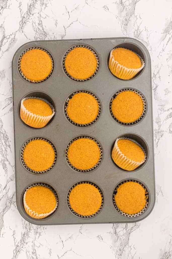Baked Pumpkin Cupcakes in a baking pan