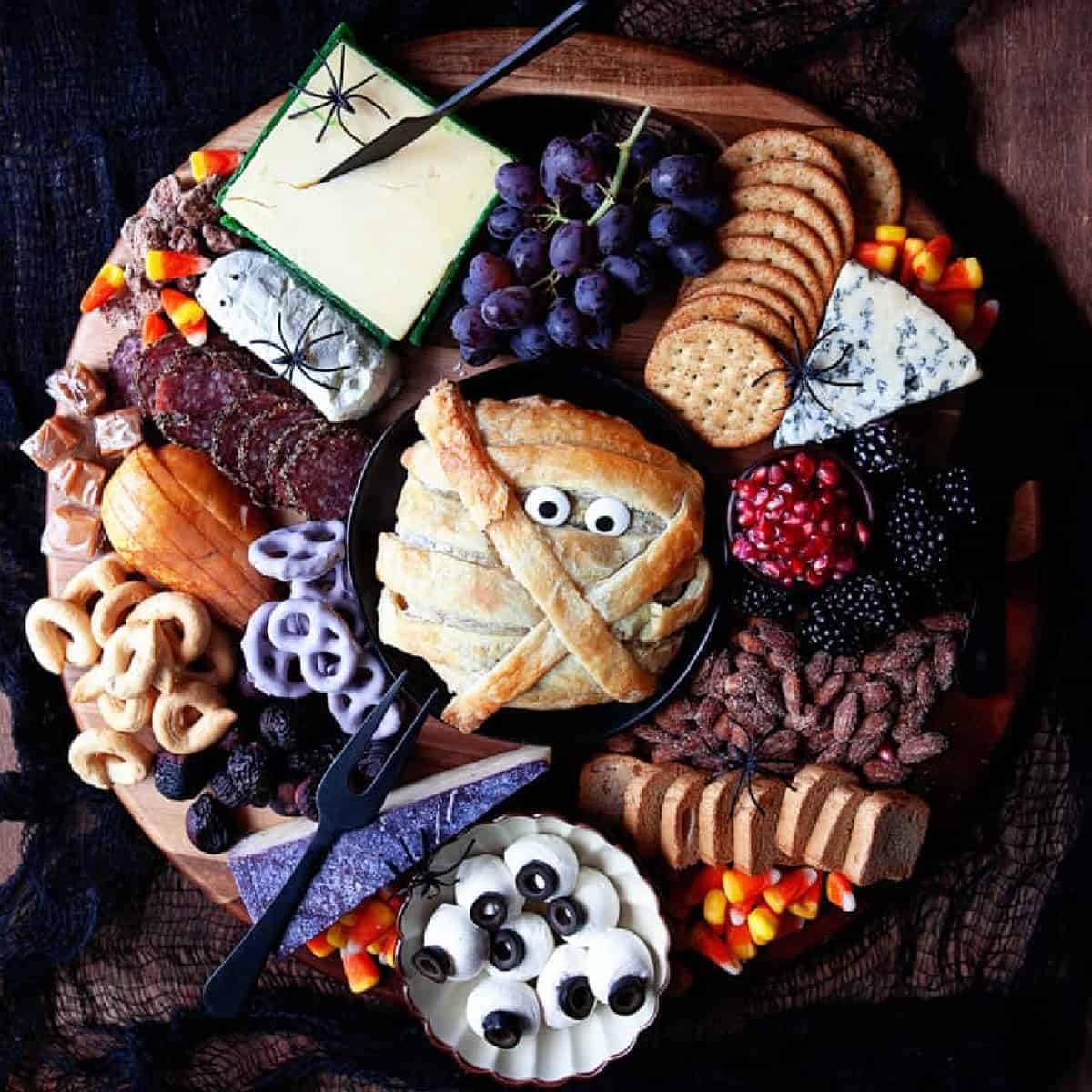 Square photo of a Halloween Cheese Board. 