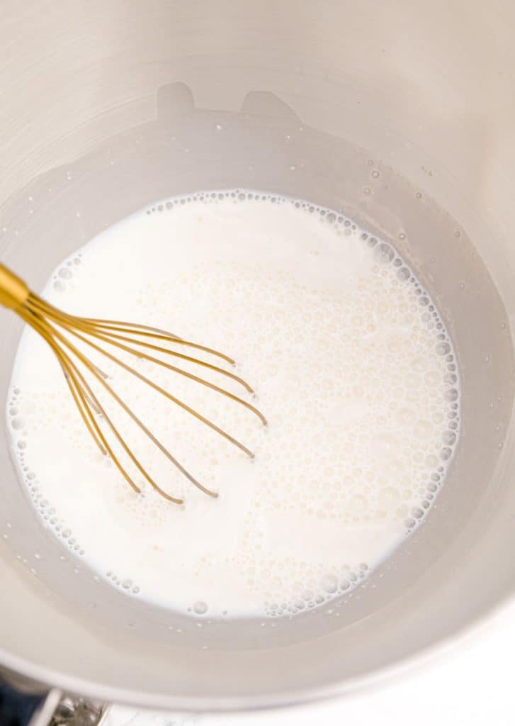 Whisk in milk and yeast
