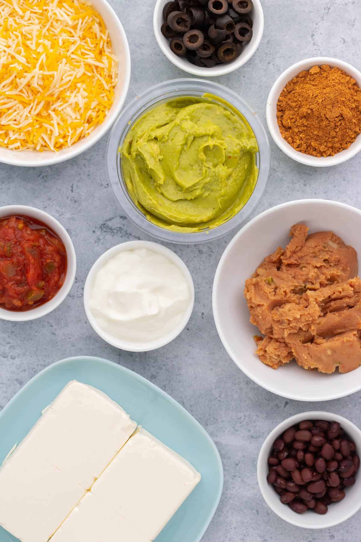 Ingredients used in making Tex-Mex style layered Spider Web Dip.