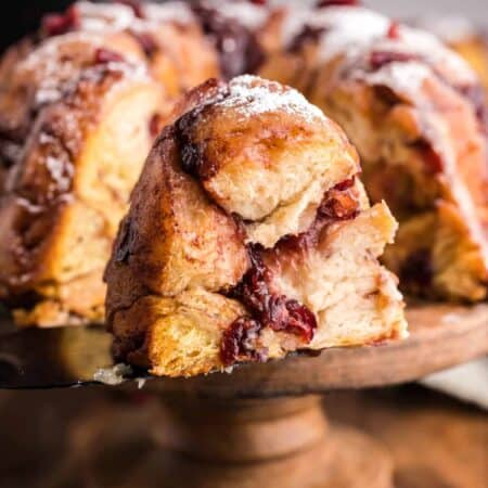 Air Fryer Holiday Monkey Bread on a wooden stand close-up view