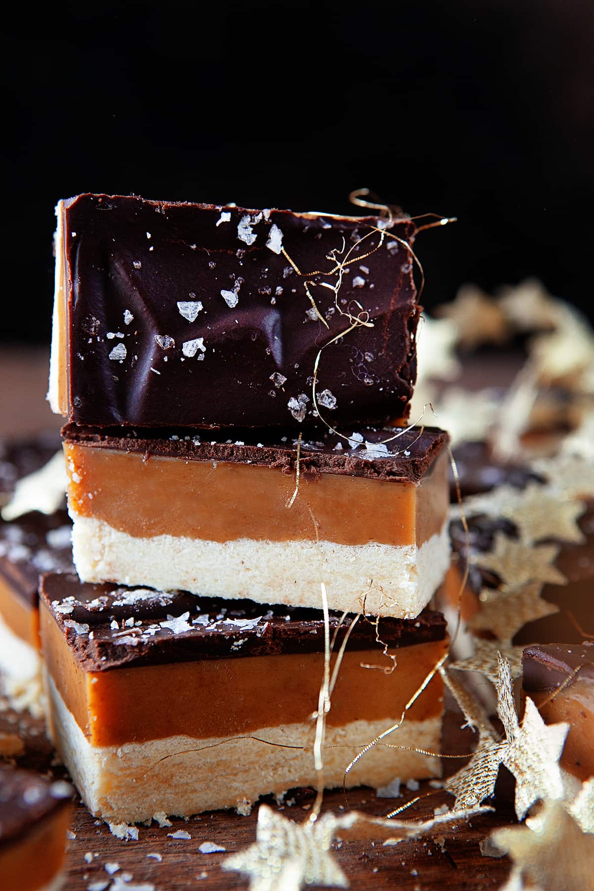 Stacked Millionaire bars decorated with gold tinsel. 