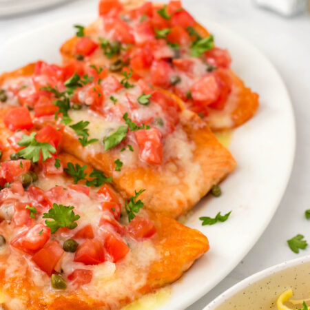 Copycat Buca di Beppo Salmon Sorrento on a platter.