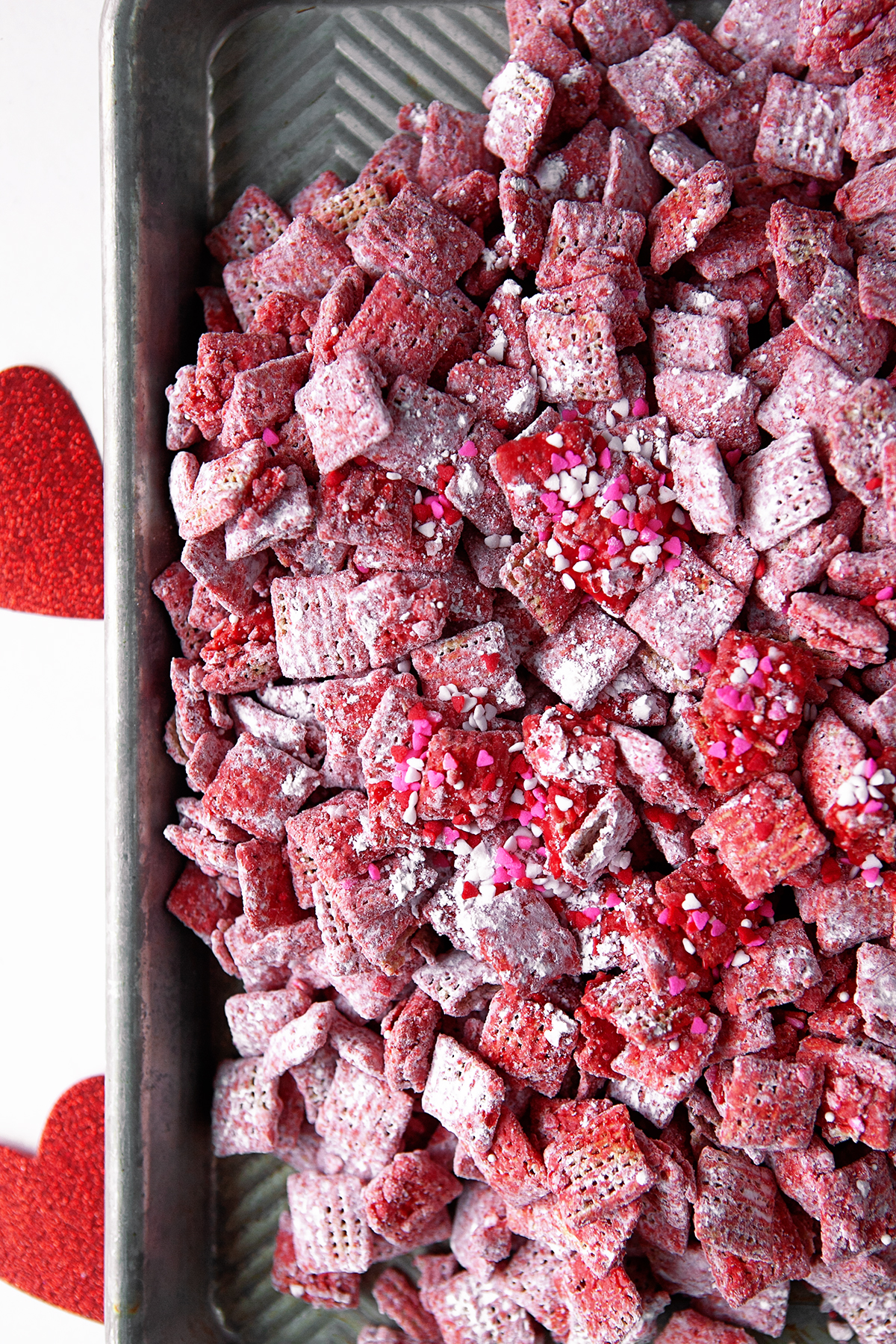 Red puppy chow with sprinkles