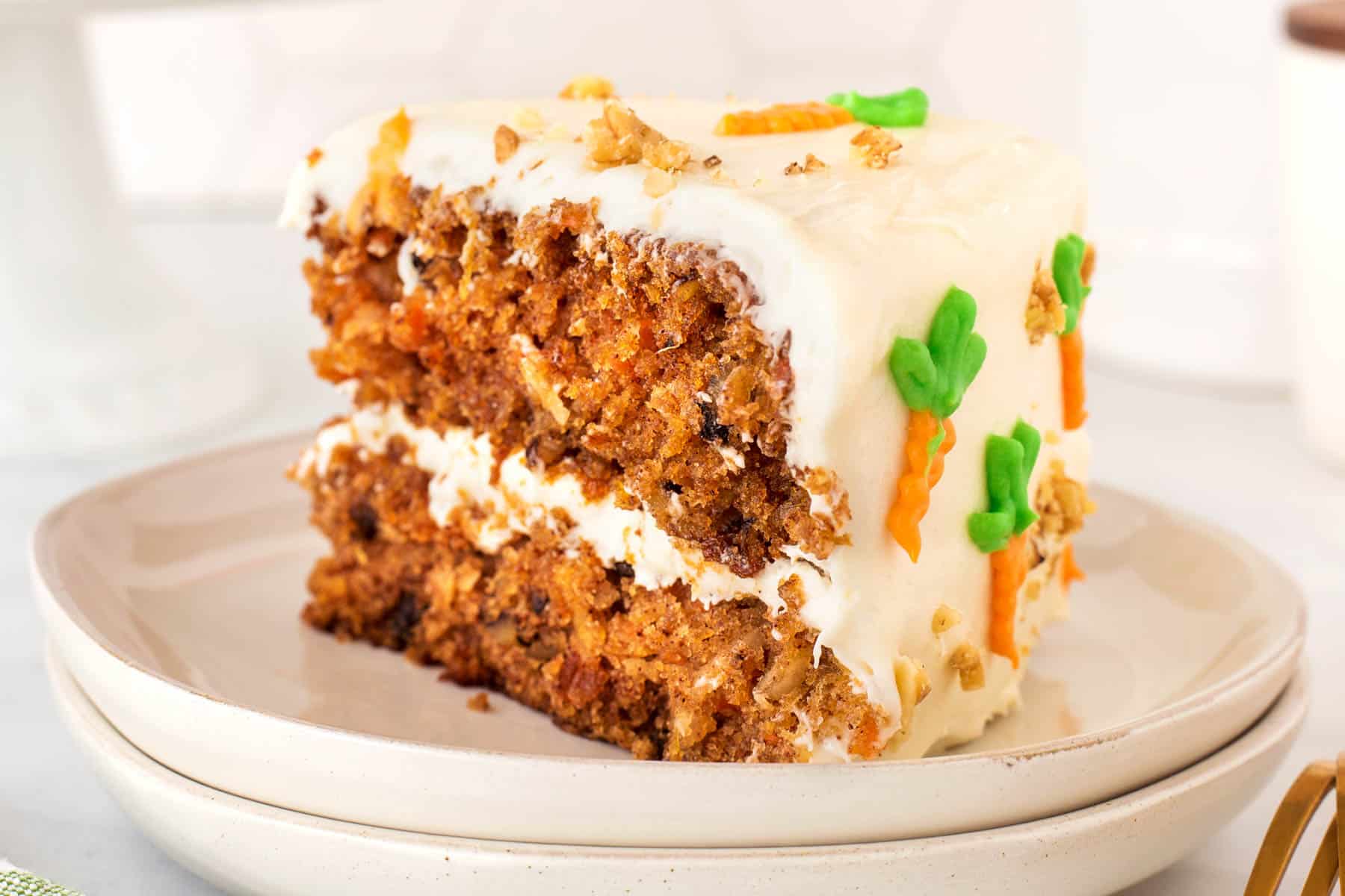 Slice of carrot cake on a plate. 