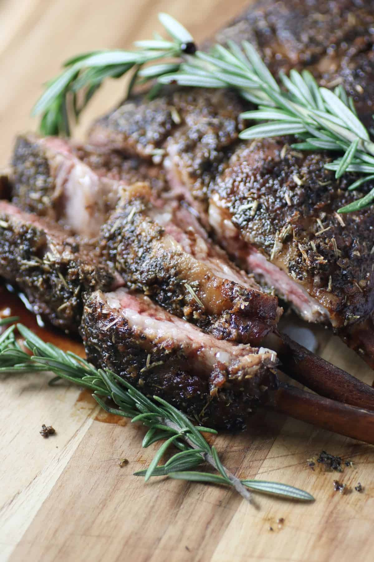 https://noshingwiththenolands.com/wp-content/uploads/2022/03/Smoked-Rack-of-Lamb-3-Custom-2.jpg