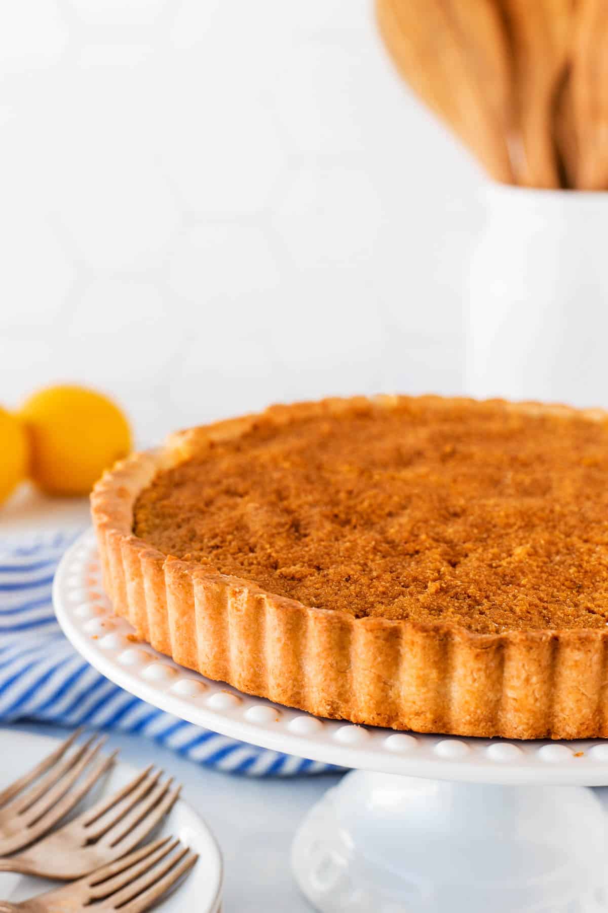Treacle tart on a cake stand.