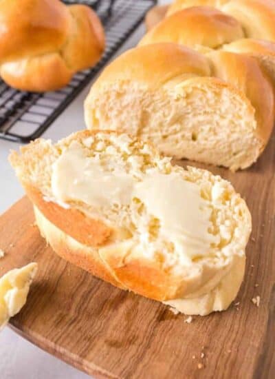 cropped-White-Braided-Bread-sliced-with-butter.jpg