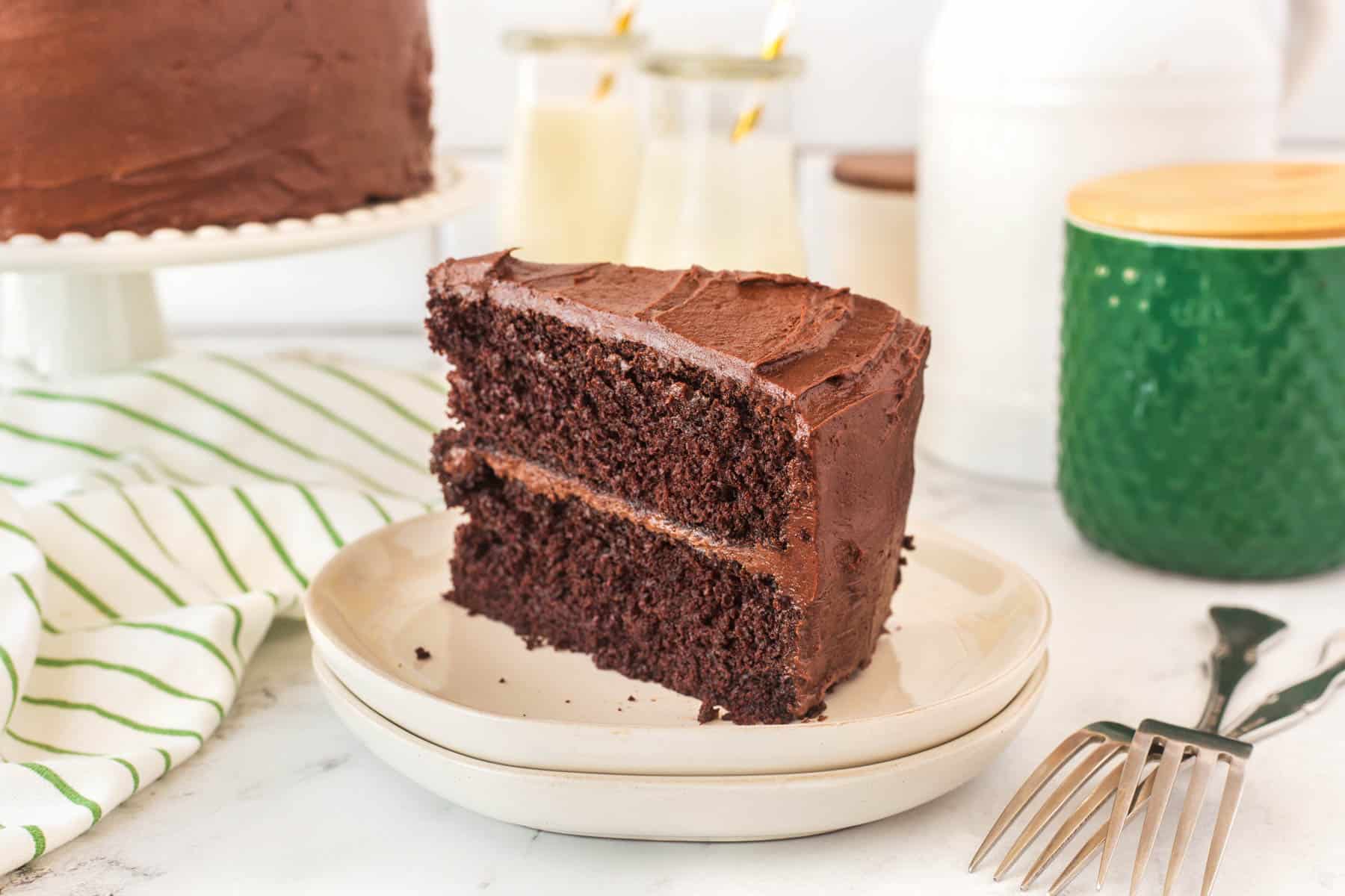 Slice of chocolate cake on a plate. 