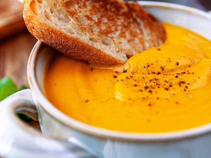 https://noshingwiththenolands.com/wp-content/uploads/2022/04/Carrot-Ginger-Soup-IMG_4583-720x540.jpg