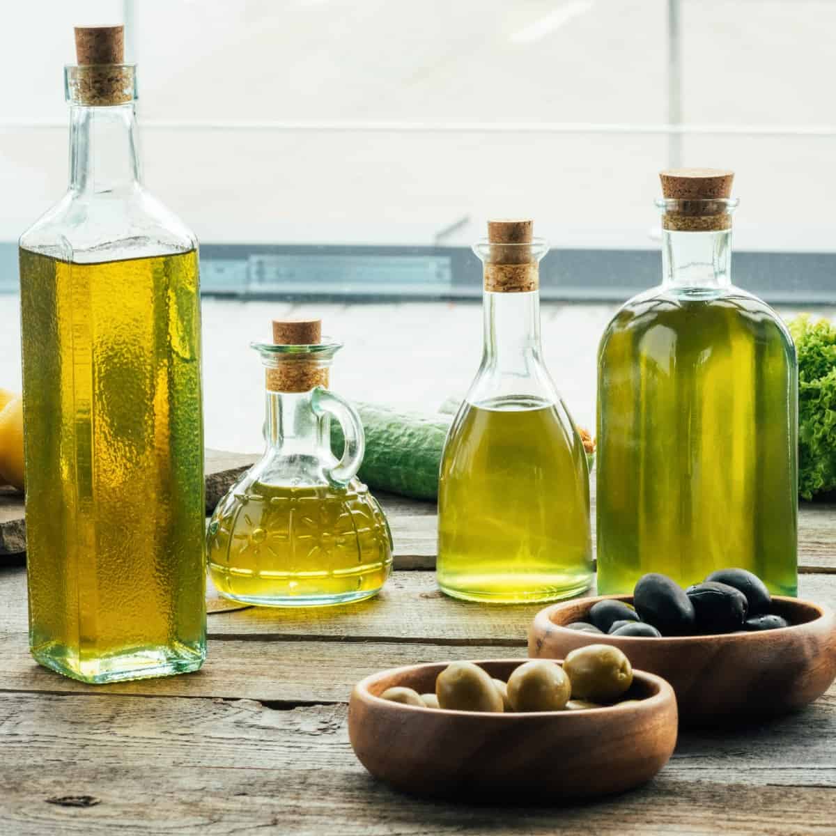 Olive oil bottles with vegetables 