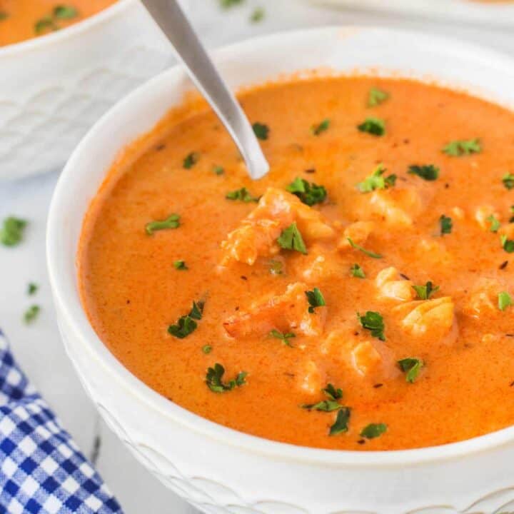 Lobster Bisque in a bowl with a spoon