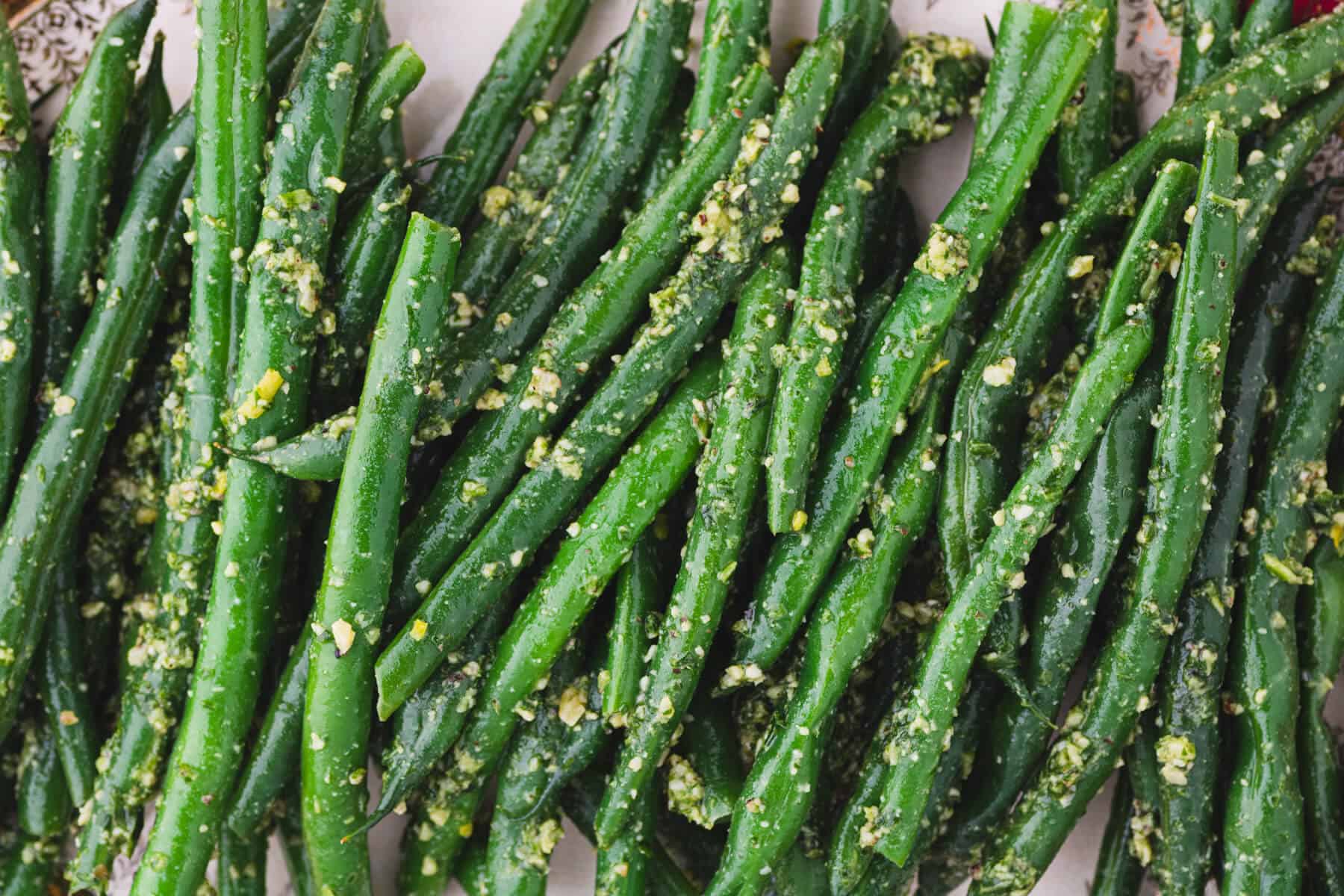 Vibrant Green Beans tossed in pesto.