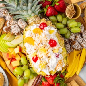 Easy Pina Colada Fruit Dip - cool whip fruit dip on a platter with fresh fruit