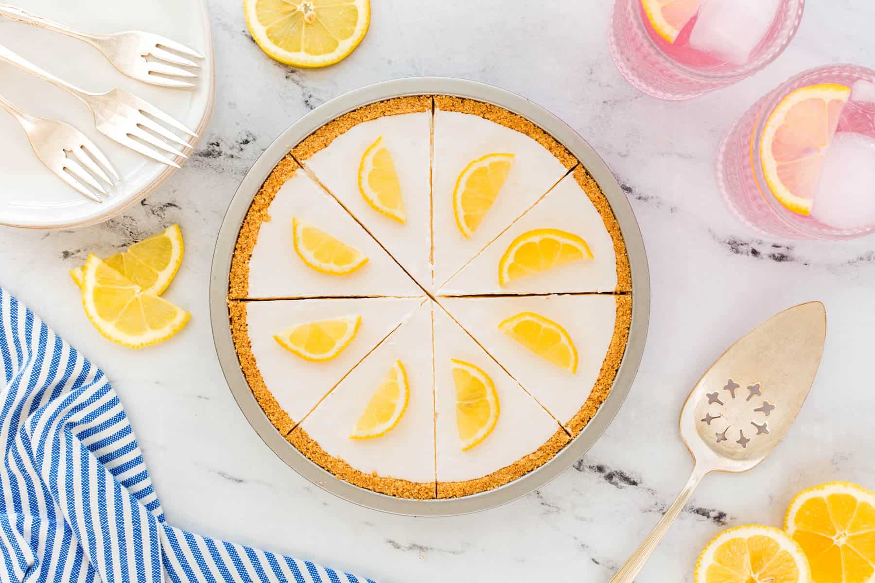 Horizontal photo of a sliced lemonade pie from overhead. 