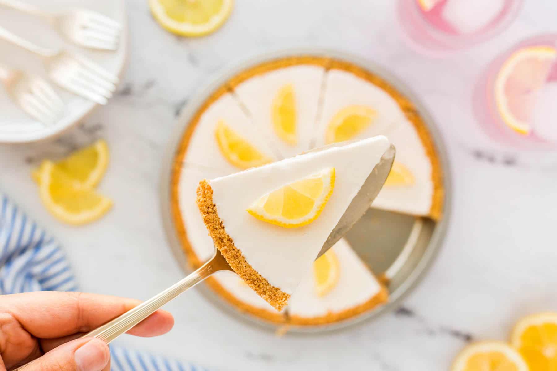 Horizontal photo of serving a lemonade pie slice. 