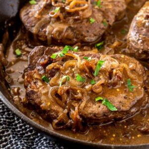 Filet Mignon in a pan with shallot mustard gravy