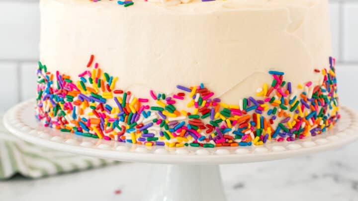 Super Moist Vanilla Cake with Vanilla Buttercream Frosting - The Baking  ChocolaTess