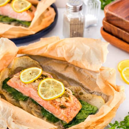 Opened package of salmon en papillote.