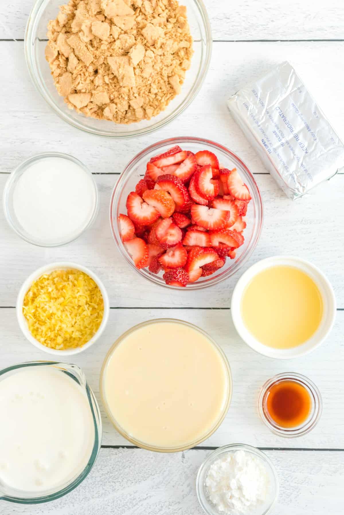 Ingredients for no-churn Lemon Strawberry Cheesecake Ice Cream. 