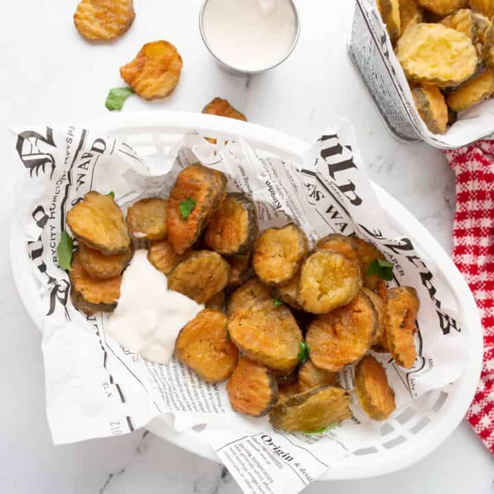 featured image of deep fried pickles in a fry basket
