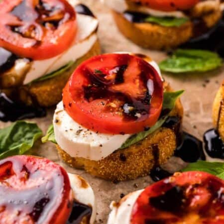 Close-up, slight overhead shot of a Bruschetta Caprese appetizer.