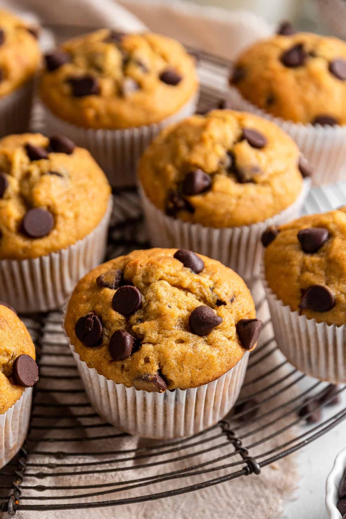 Banana Chocolate Chip Muffins on a cooling rack. 