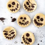 Overhead of Jack Skellington Faced mini cheesecakes.