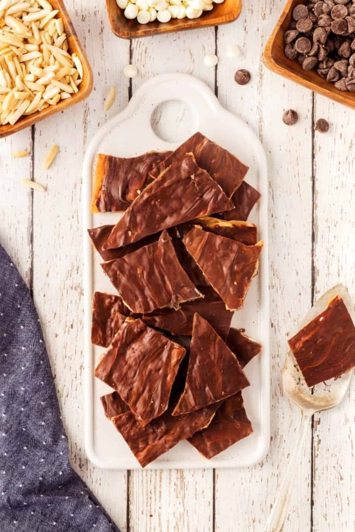 Copycat Almond Roca pieces served on a white platter.