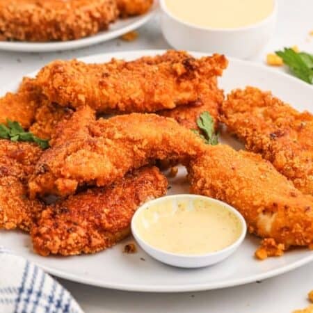 Plateful of Cap'n Crunch Chicken Fingers Recipe with dipping sauce