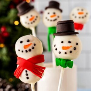 Close-up of two snowman cake pops