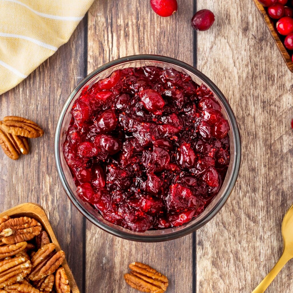 Overhead of cranberry sauce in a bowl.