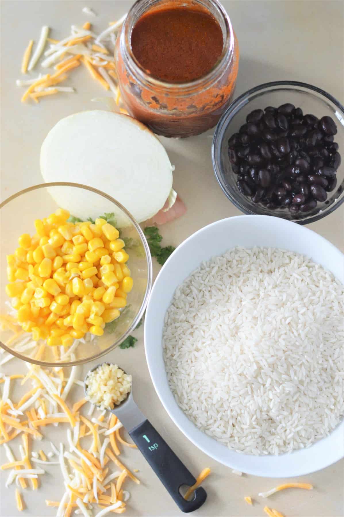 Ingredients for Cheesy Enchilada Rice. 