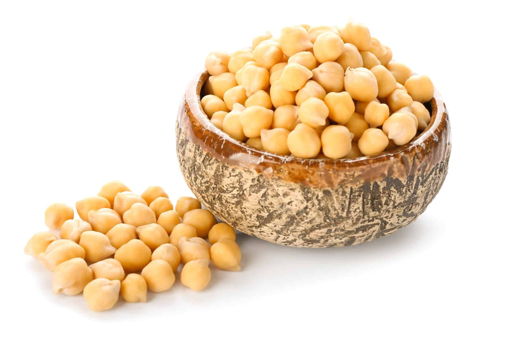 Bowl with chickpeas on white background.
