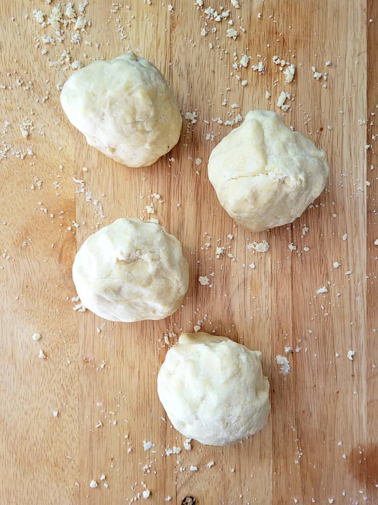 Dough rolled into four balls. 