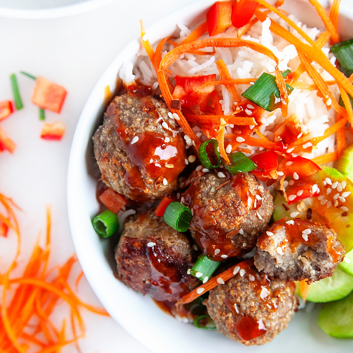 Overhead square photo of a chicken meatball bowl. 