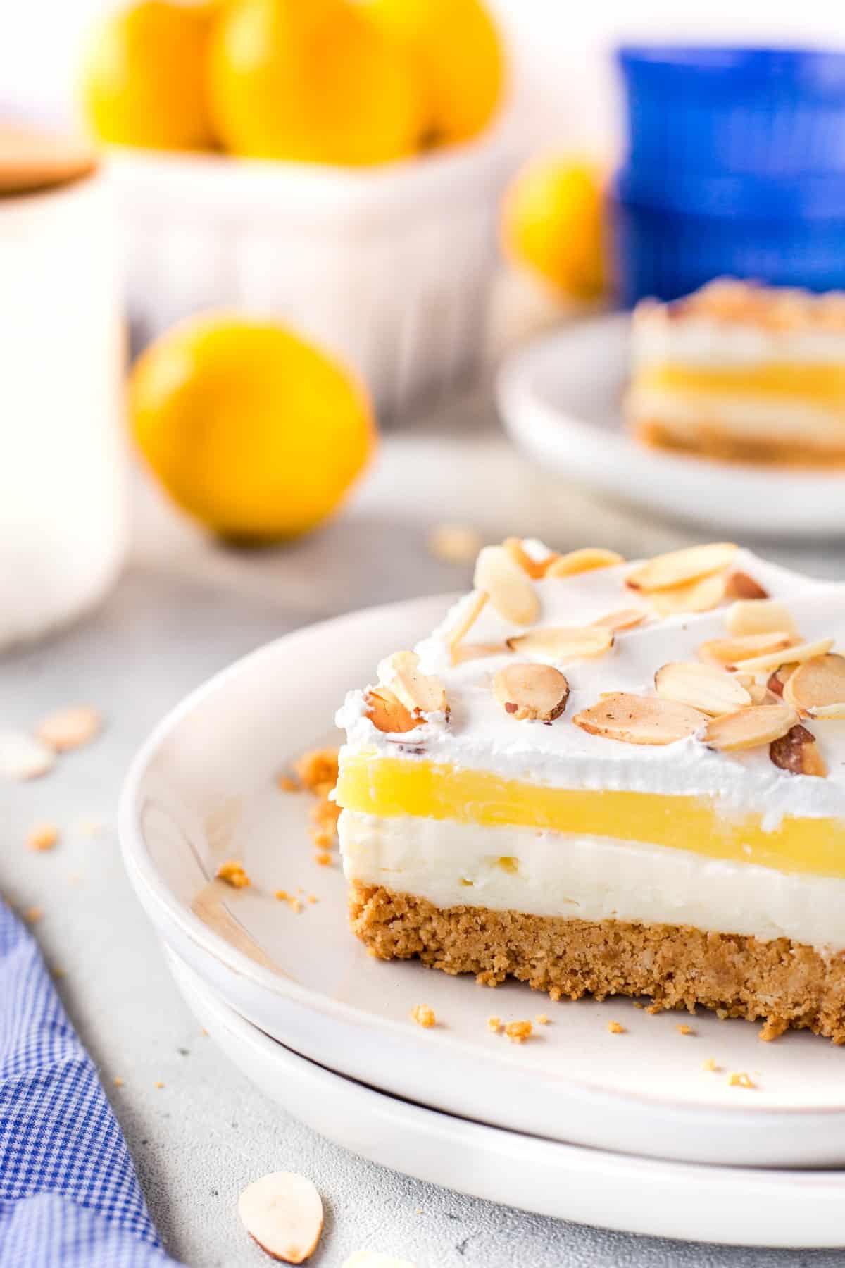 Large slice of lemon lush on a plate. 