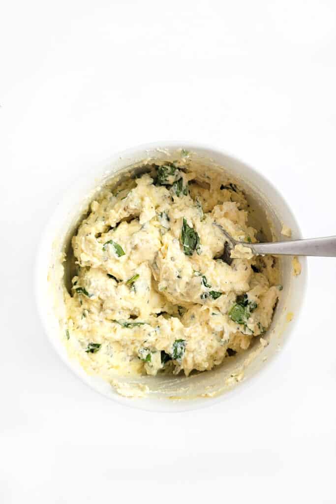 Ricotta cheese mixture in a bowl. 