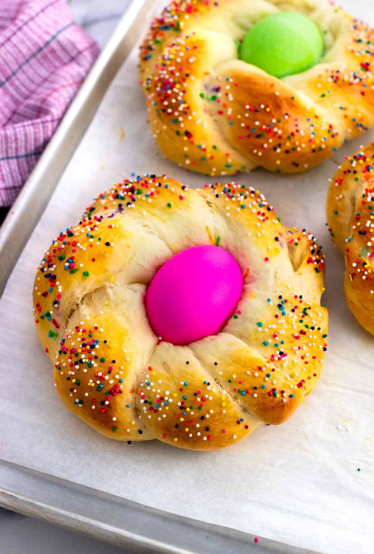 Italian Easter bread with a pink egg in the middle. 