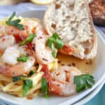 Shrimp Scampi on pasta with fresh bread.