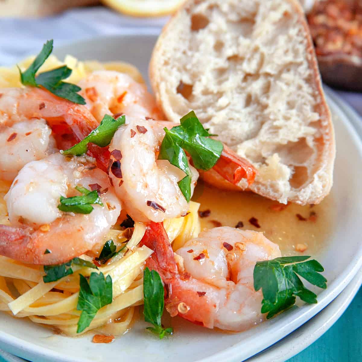 Shrimp Scampi over pasta with artisan bread. 