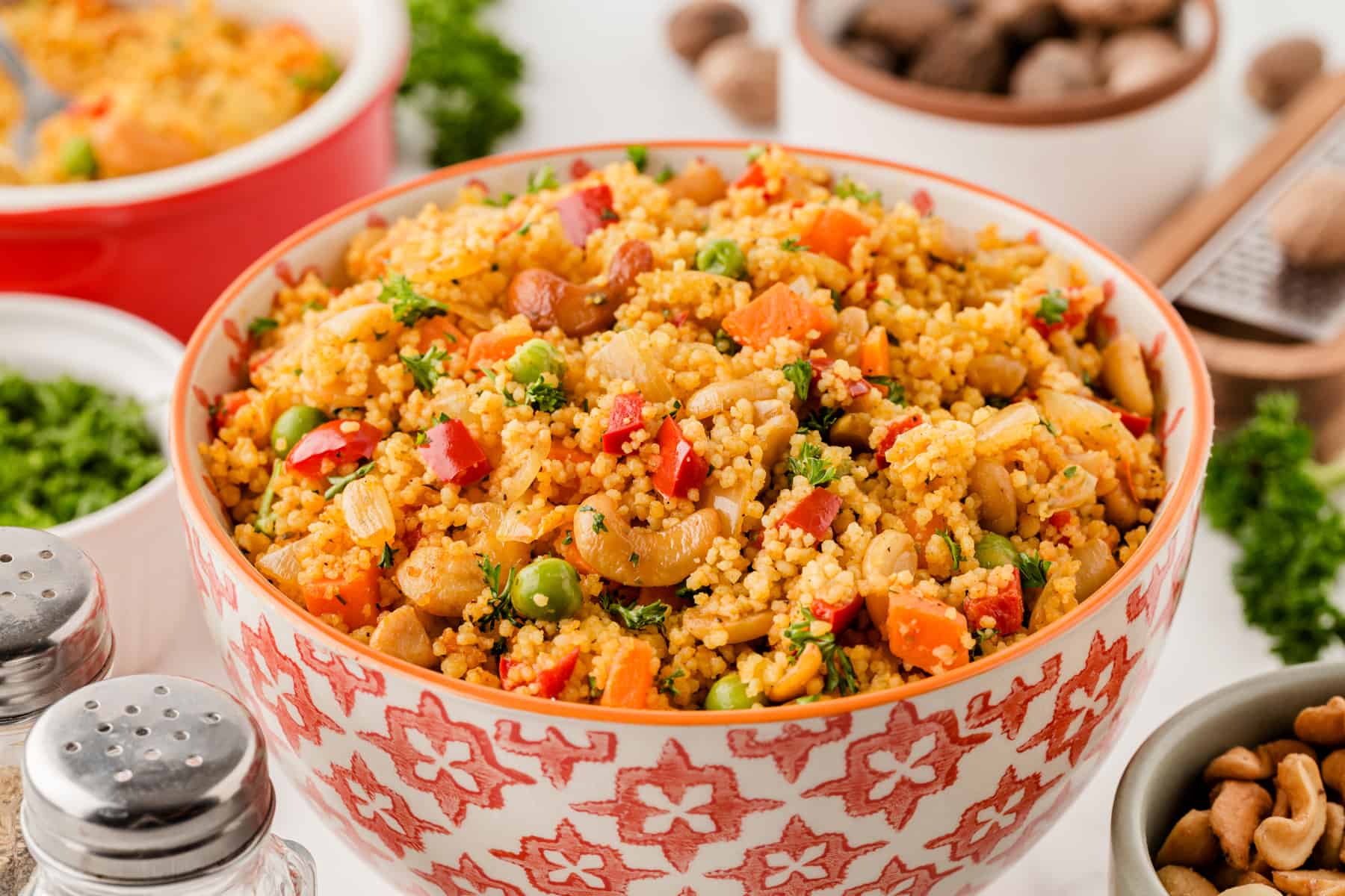 Horizontal picture of couscous in a Moroccan looking bowl. 