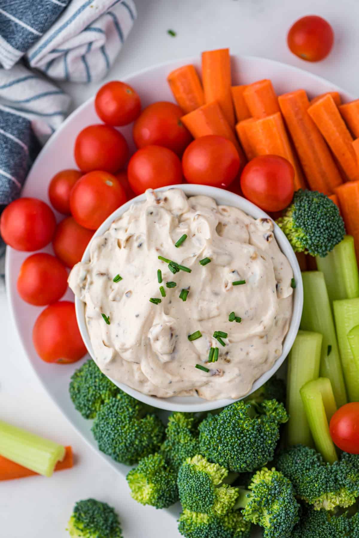 Overhead photo of veggies and French Onion Dip. 